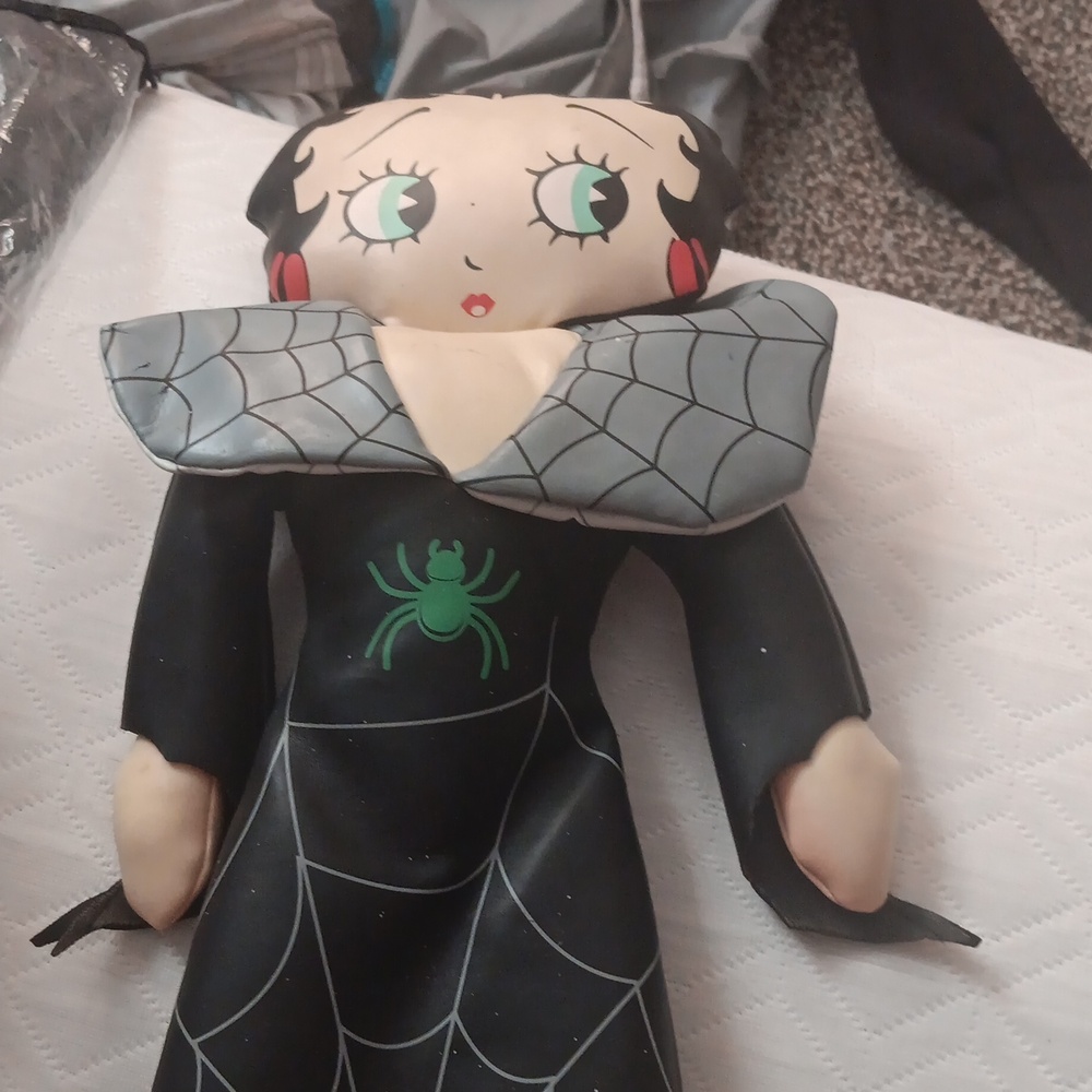 Black and Gray Doll with Spider Design